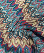 Luxury zigzag knit mesh fabric with colorful zigzag pattern and breathable texture for fashion and home decor projects