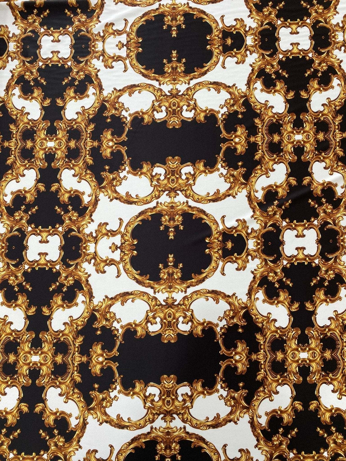 Baroque fabric with black, white, and gold ornate pattern for elegant crafts