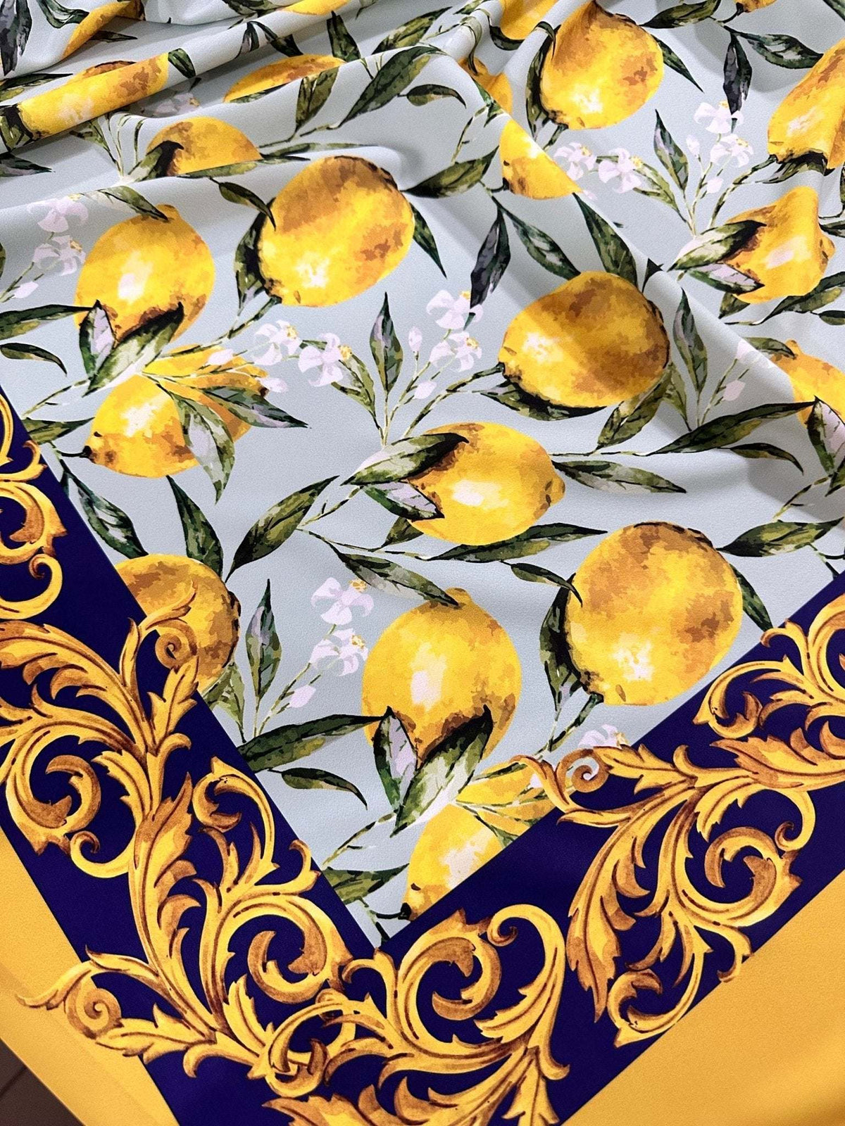 Baroque Lemon Fabric with Sicilian lemon pattern and ornate golden baroque border on yellow and blue background