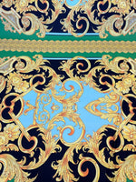 Baroque silky crepe fabric with intricate gold and blue baroque patterns on black background
