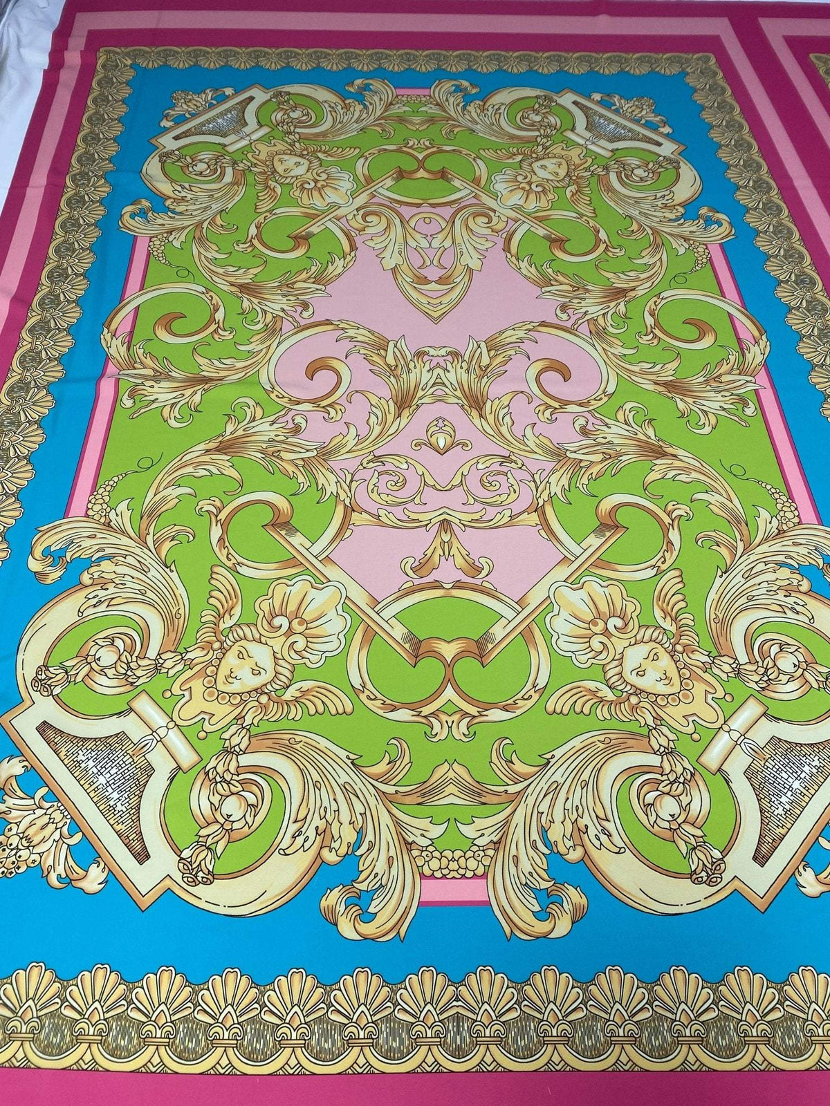 Baroque pink silky crepe fabric panel with intricate gold baroque design and green and blue accents