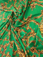 Baroque green gold print fabric with intricate ornate upholstery design and 150cm width