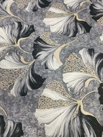 Black and white ginkgo leaf fabric with elegant gold vein botanical print on textured background