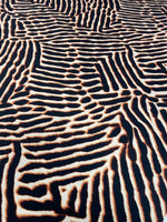 Brown and black animal print fabric with bold pattern and 150cm width for sewing projects