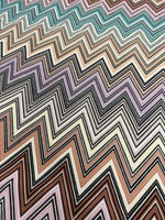 Colorful zigzag upholstery fabric with vibrant chevron pattern for creative home décor and furniture projects