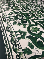 Green Baroque Floral Fabric with intricate green floral and scroll patterns on white background, ideal for upholstery and home decor