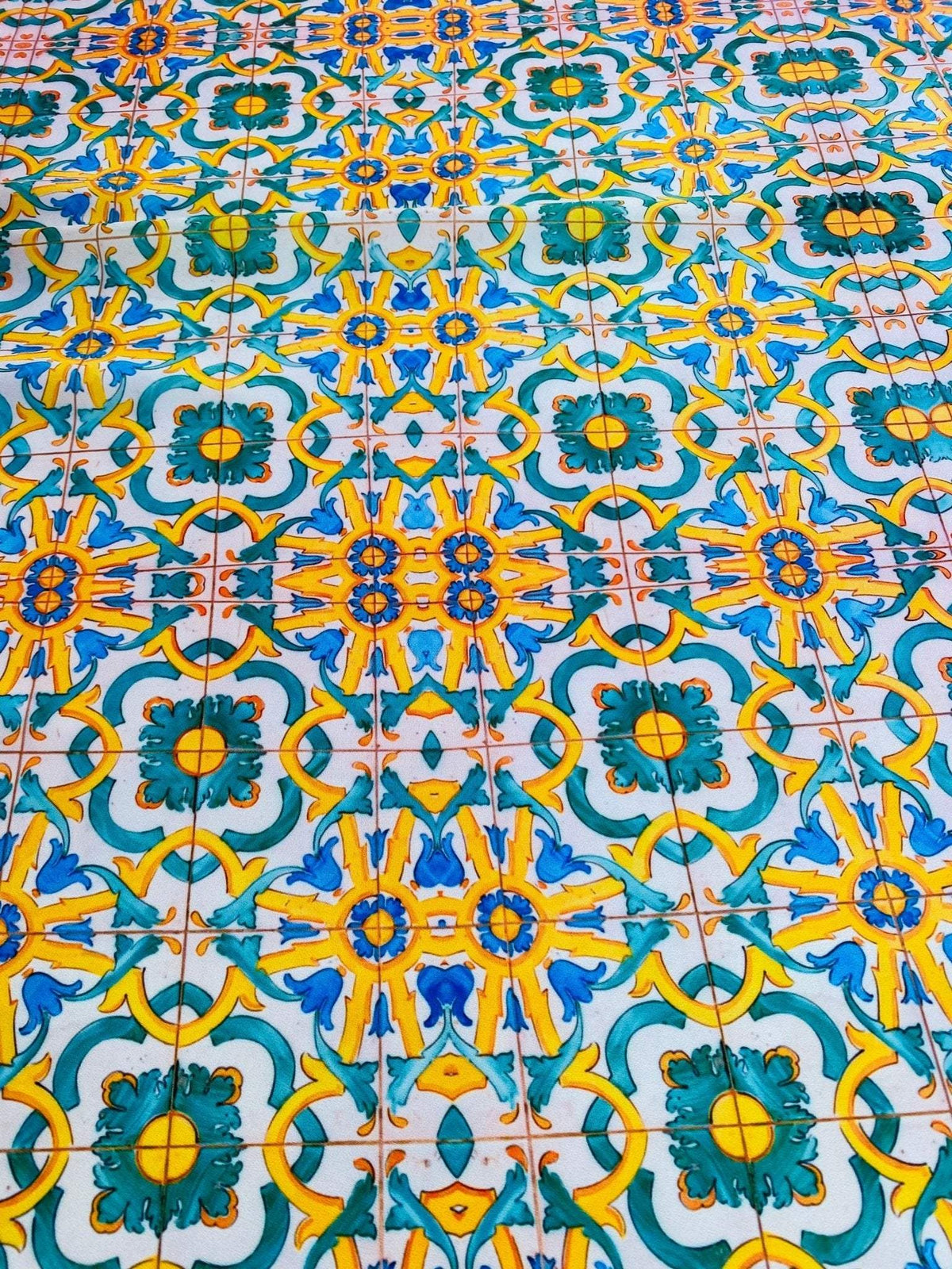 Yellow, blue and green Mediterranean tile pattern fabric with vibrant intricate design and 150cm width