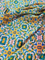 Yellow, blue, and green Mediterranean tile pattern fabric with intricate design and vibrant colors, fabric width 150cm