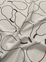 Minimalist pear print fabric with black outlined pears on a light background, soft and durable material for sewing and home decor projects