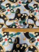 Sky blue fabric with floral and gold chain print, 150cm width