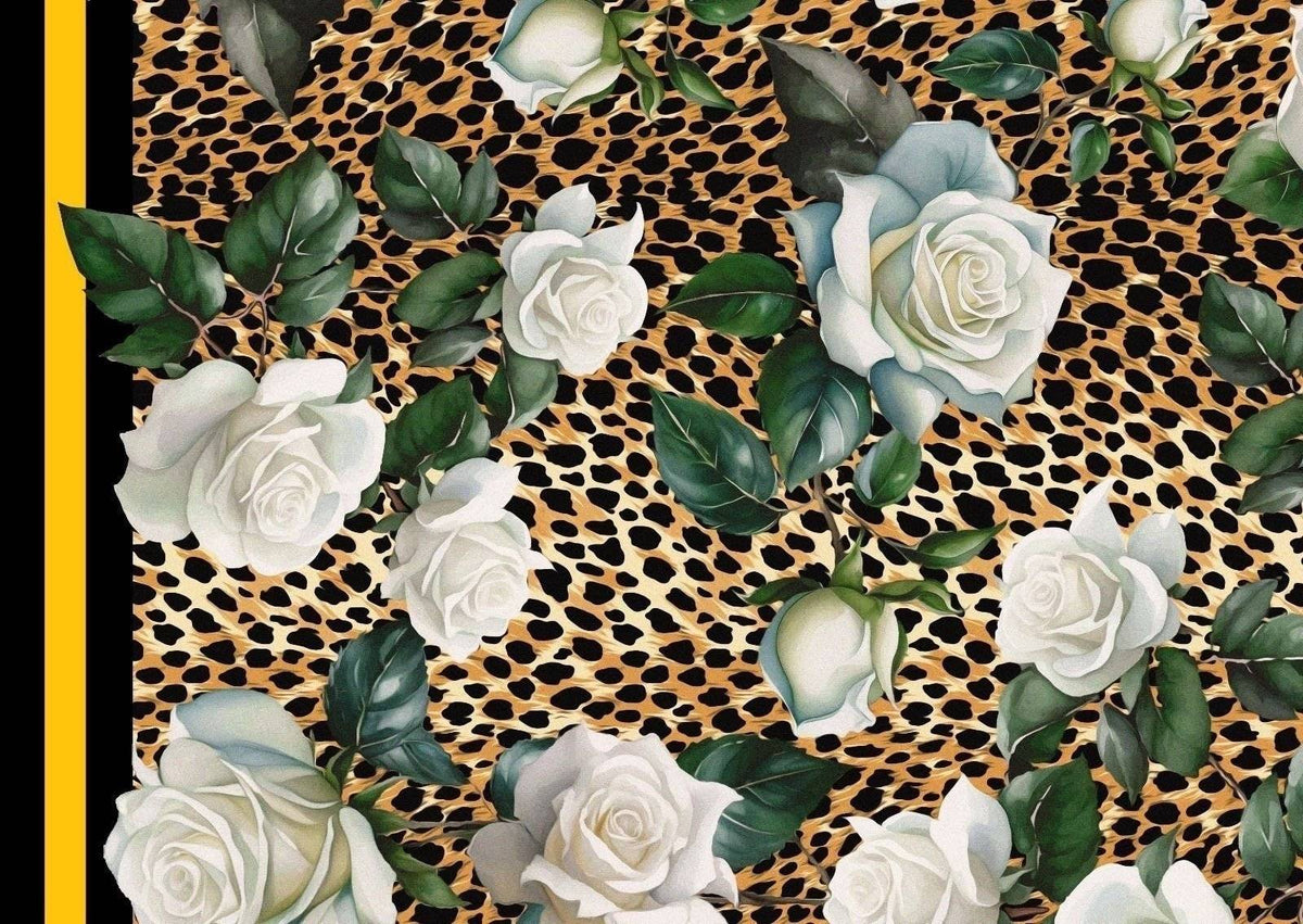 Floral and Cheetah Pattern Fabric with white roses and green leaves on a leopard print background