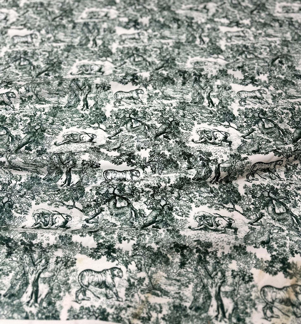 Green and white Wild Forest Animal Print Fabric with detailed wildlife and tree patterns for sewing and home decor projects
