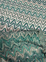Zigzag mesh fabric in green tones with textured knit pattern and 150 cm width for versatile sewing projects